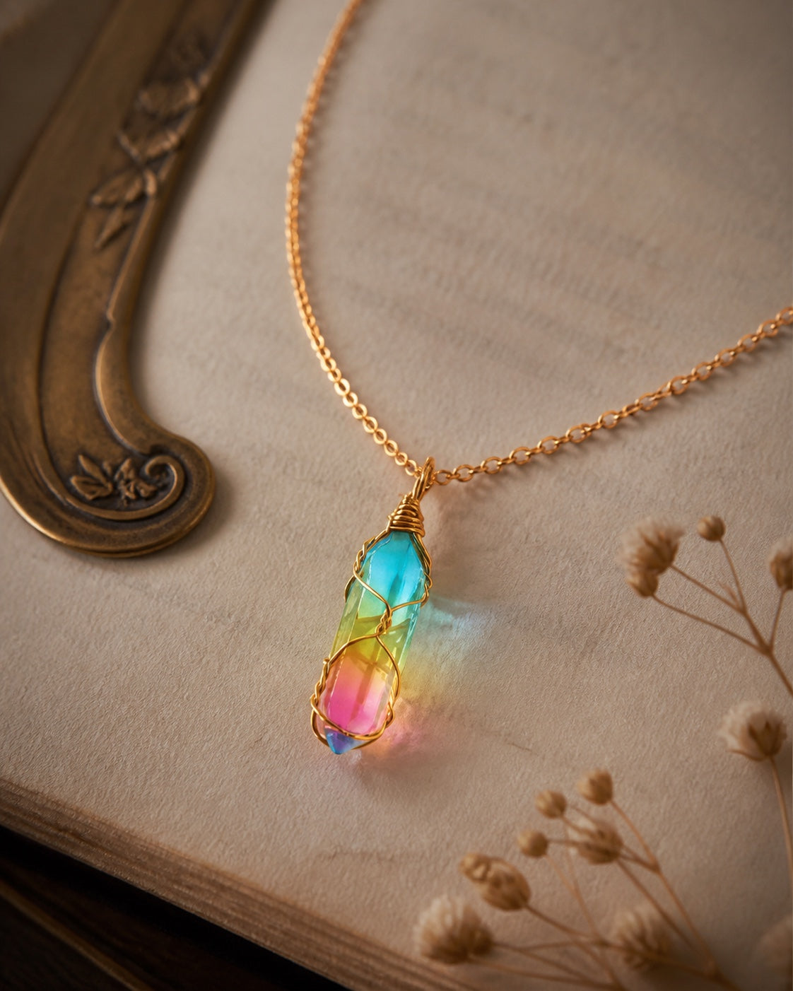 Aurora gold wire-wrapped pendant detail